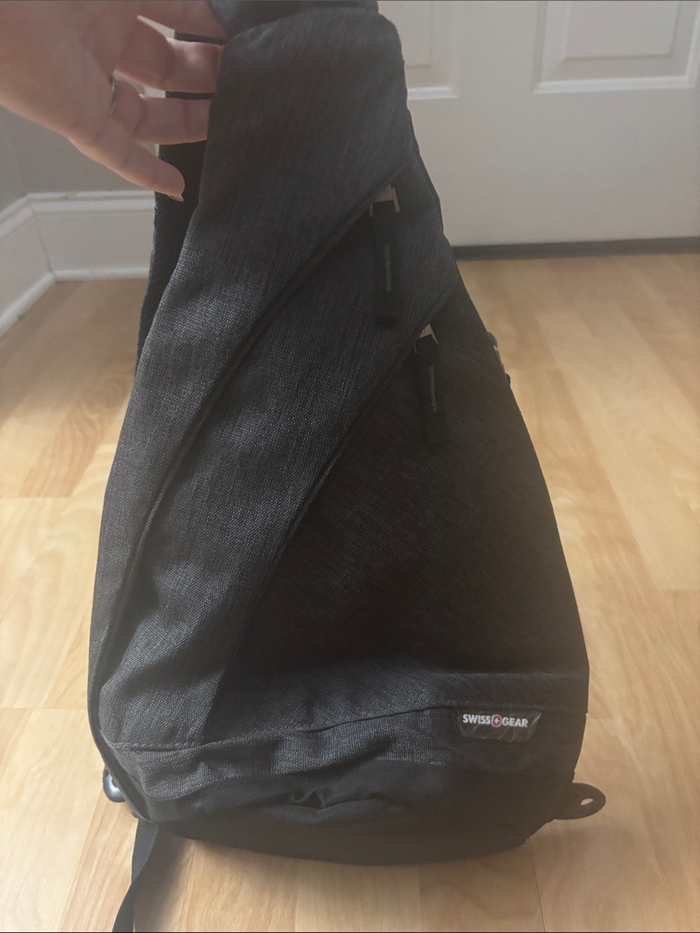 SwissGear Charcoal Black Sling Backpack with Subtle Heather Texture